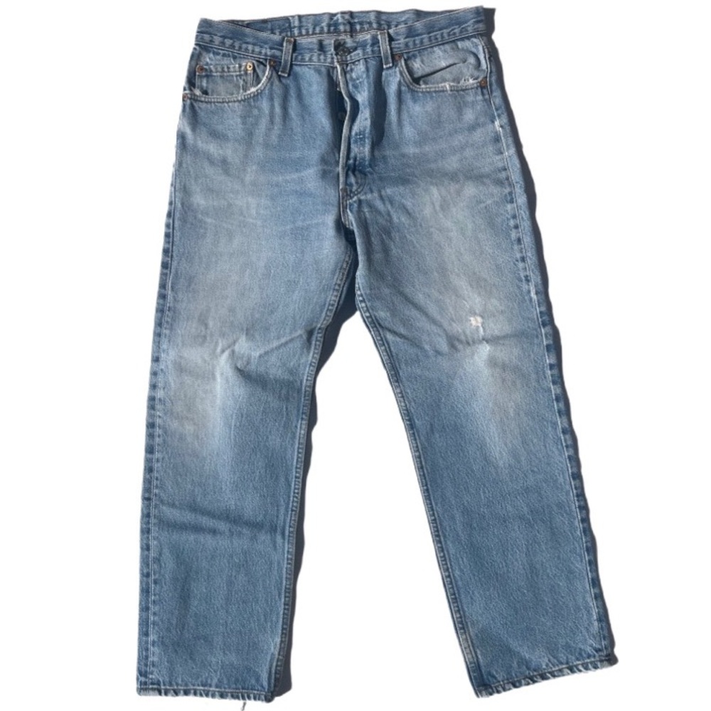 Levis 501 button fly vintage early 90s faded washed light blue denim jeans